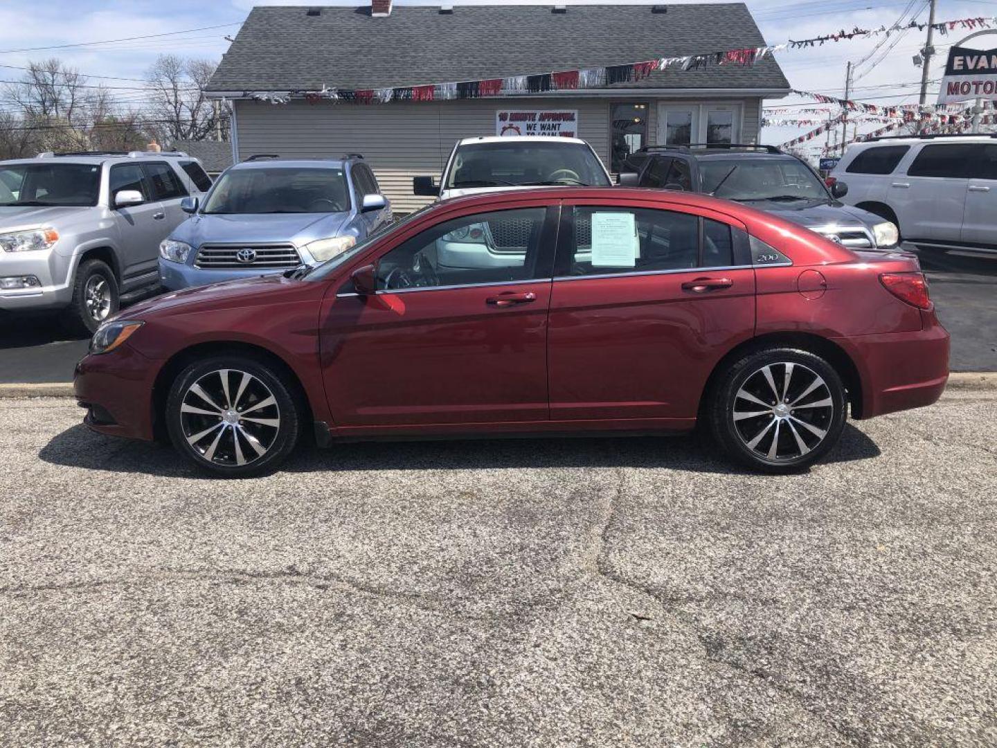 2011 MAROON CHRYSLER 200 S (1C3BC8FG5BN) with an 3.6L engine, Automatic transmission, located at 1056 E Riverside Dr, Evansville, IN, 47714, (812) 423-7026, 37.953491, -87.546654 - Photo#0