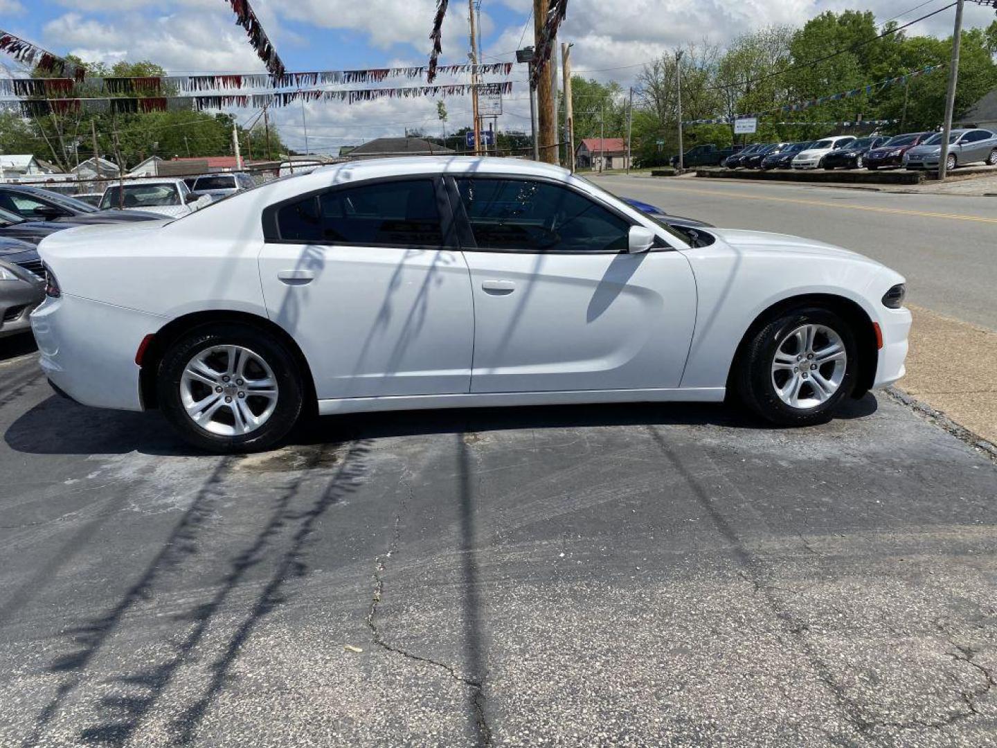 2015 WHITE DODGE CHARGER SE (2C3CDXBG0FH) with an 3.6L engine, Automatic transmission, located at 1056 E Riverside Dr, Evansville, IN, 47714, (812) 423-7026, 37.953491, -87.546654 - Photo#0