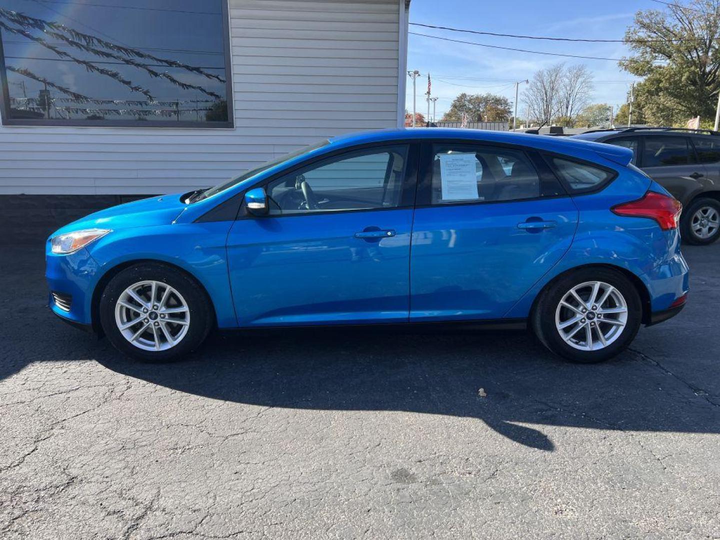 2016 BLUE FORD FOCUS SE (1FADP3K22GL) with an 2.0L engine, Automatic transmission, located at 1056 E Riverside Dr, Evansville, IN, 47714, (812) 423-7026, 37.953491, -87.546654 - Photo#0