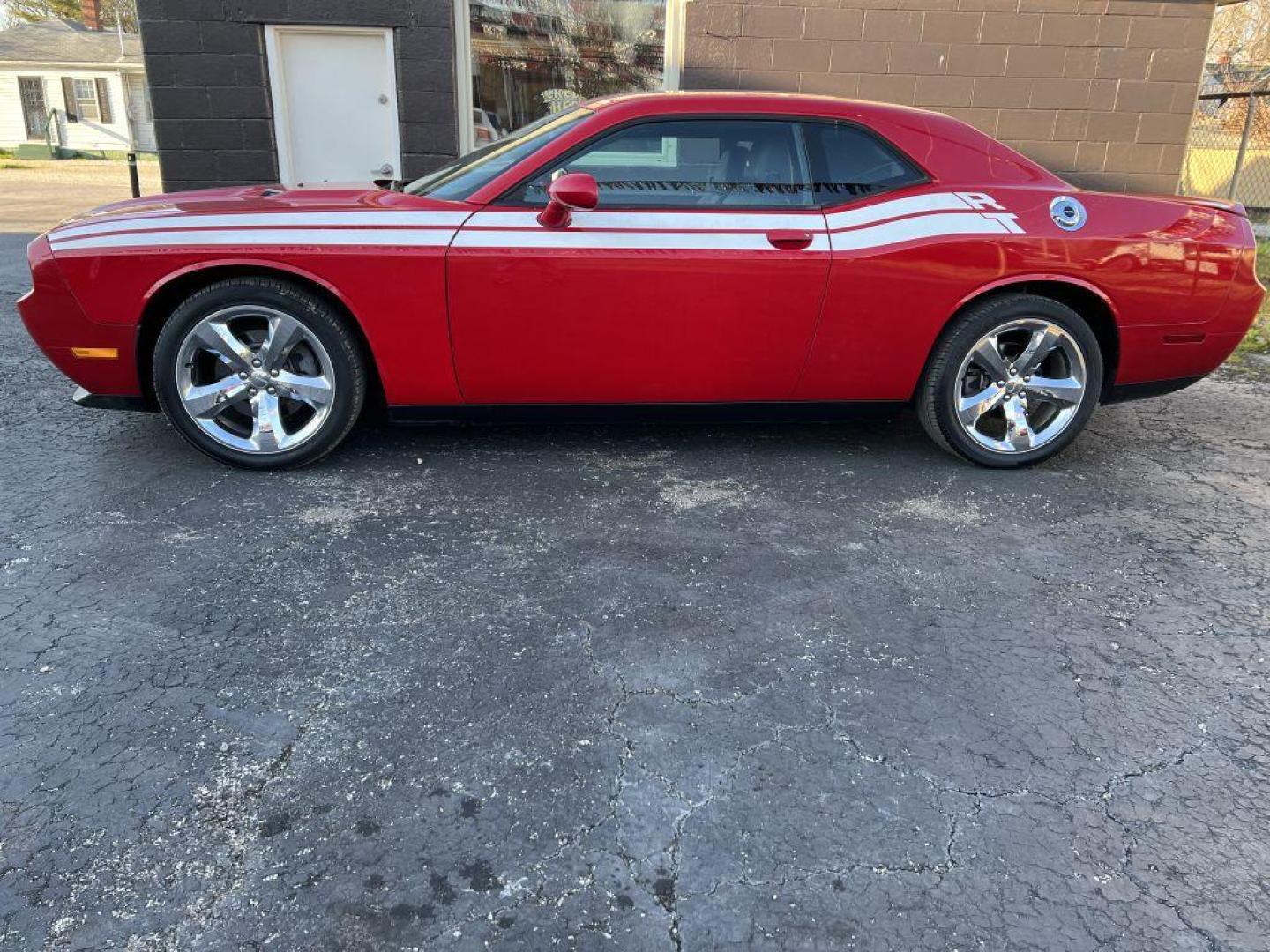 2012 RED DODGE CHALLENGER SXT (2C3CDYAG9CH) with an 3.6L engine, Automatic transmission, located at 1056 E Riverside Dr, Evansville, IN, 47714, (812) 423-7026, 37.953491, -87.546654 - Photo#0