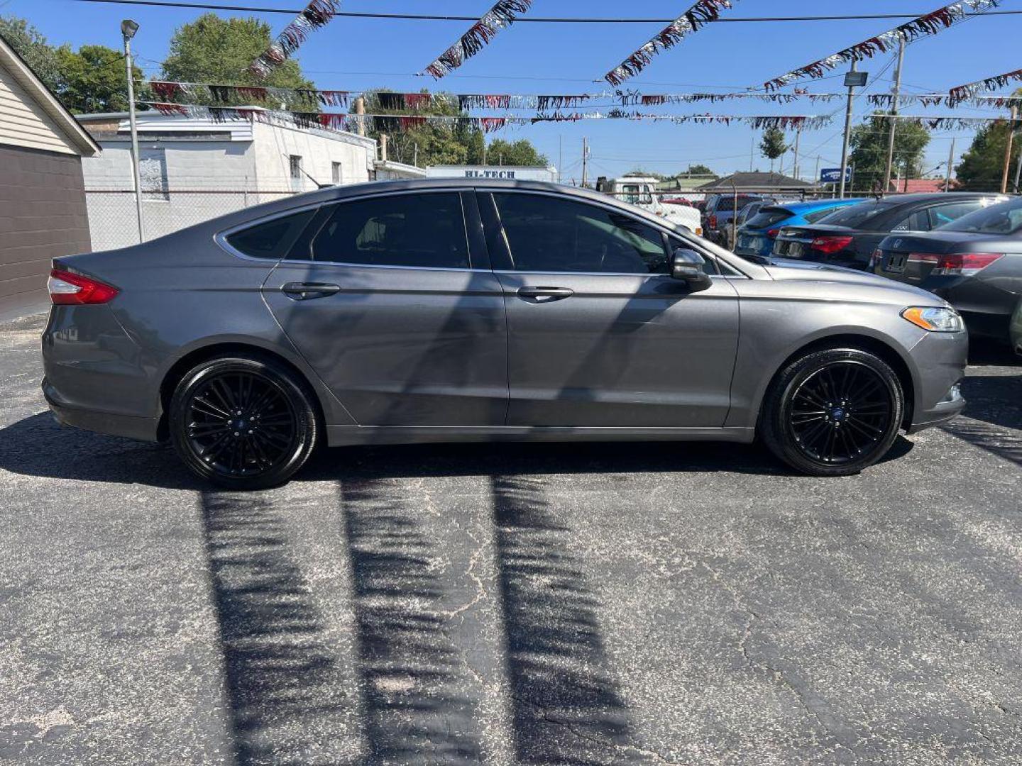 2014 GRAY FORD FUSION SE (1FA6P0HD6E5) with an 1.5L engine, Automatic transmission, located at 1056 E Riverside Dr, Evansville, IN, 47714, (812) 423-7026, 37.953491, -87.546654 - Photo#0