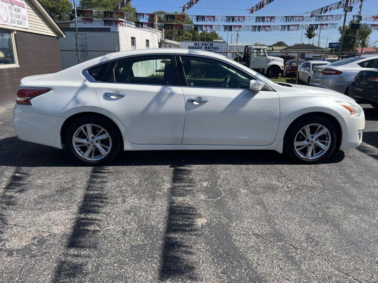 2015 WHITE NISSAN ALTIMA 2.5 (1N4AL3AP0FC) with an 2.5L engine, Continuously Variable transmission, located at 1056 E Riverside Dr, Evansville, IN, 47714, (812) 423-7026, 37.953491, -87.546654 - Photo#0