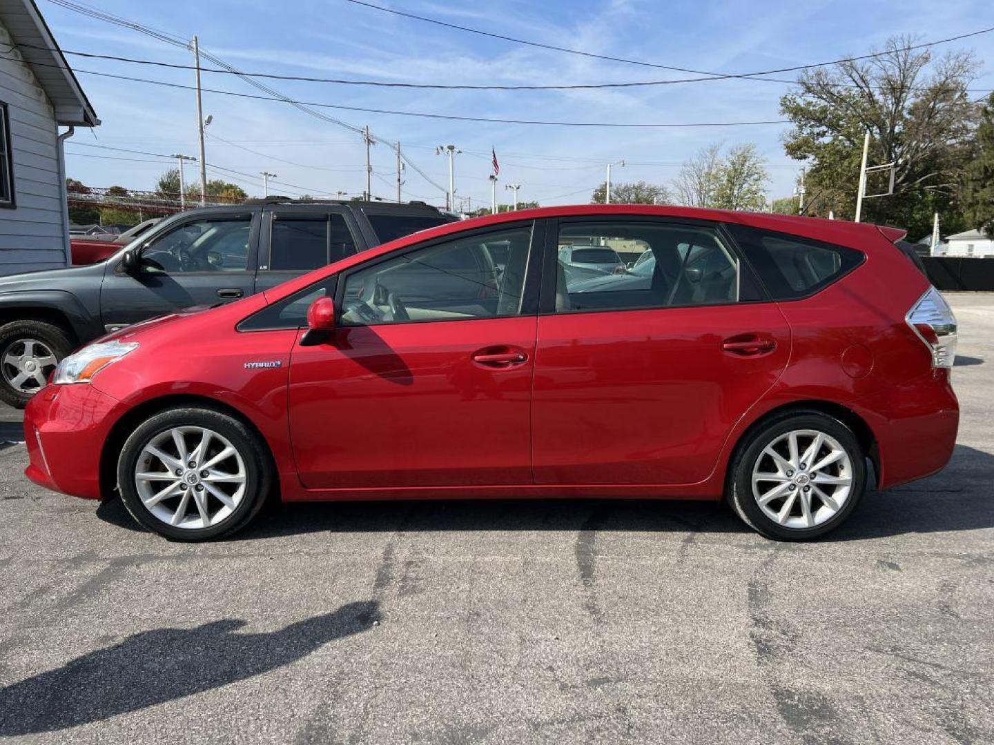 2012 RED TOYOTA PRIUS V (JTDZN3EU1C3) with an 1.8L engine, Continuously Variable transmission, located at 1056 E Riverside Dr, Evansville, IN, 47714, (812) 423-7026, 37.953491, -87.546654 - Photo#0