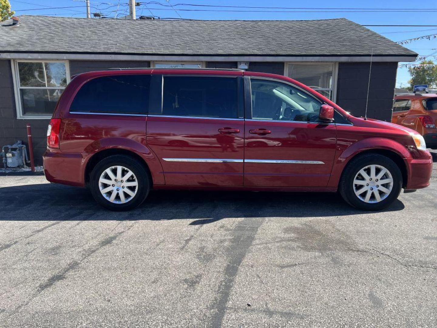 2014 RED CHRYSLER TOWN and COUNTRY TOURING (2C4RC1BG0ER) with an 3.6L engine, Automatic transmission, located at 1056 E Riverside Dr, Evansville, IN, 47714, (812) 423-7026, 37.953491, -87.546654 - Photo#0