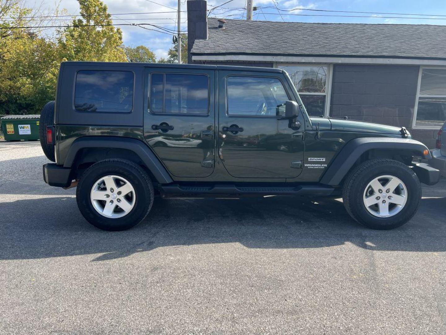 2010 GREEN JEEP WRANGLER UNLIMI SPORT (1J4BA3H14AL) with an 3.8L engine, Automatic transmission, located at 1056 E Riverside Dr, Evansville, IN, 47714, (812) 423-7026, 37.953491, -87.546654 - Photo#0