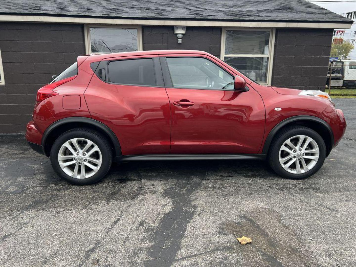 2013 RED NISSAN JUKE S (JN8AF5MV0DT) with an 1.6L engine, Continuously Variable transmission, located at 1056 E Riverside Dr, Evansville, IN, 47714, (812) 423-7026, 37.953491, -87.546654 - Photo#0