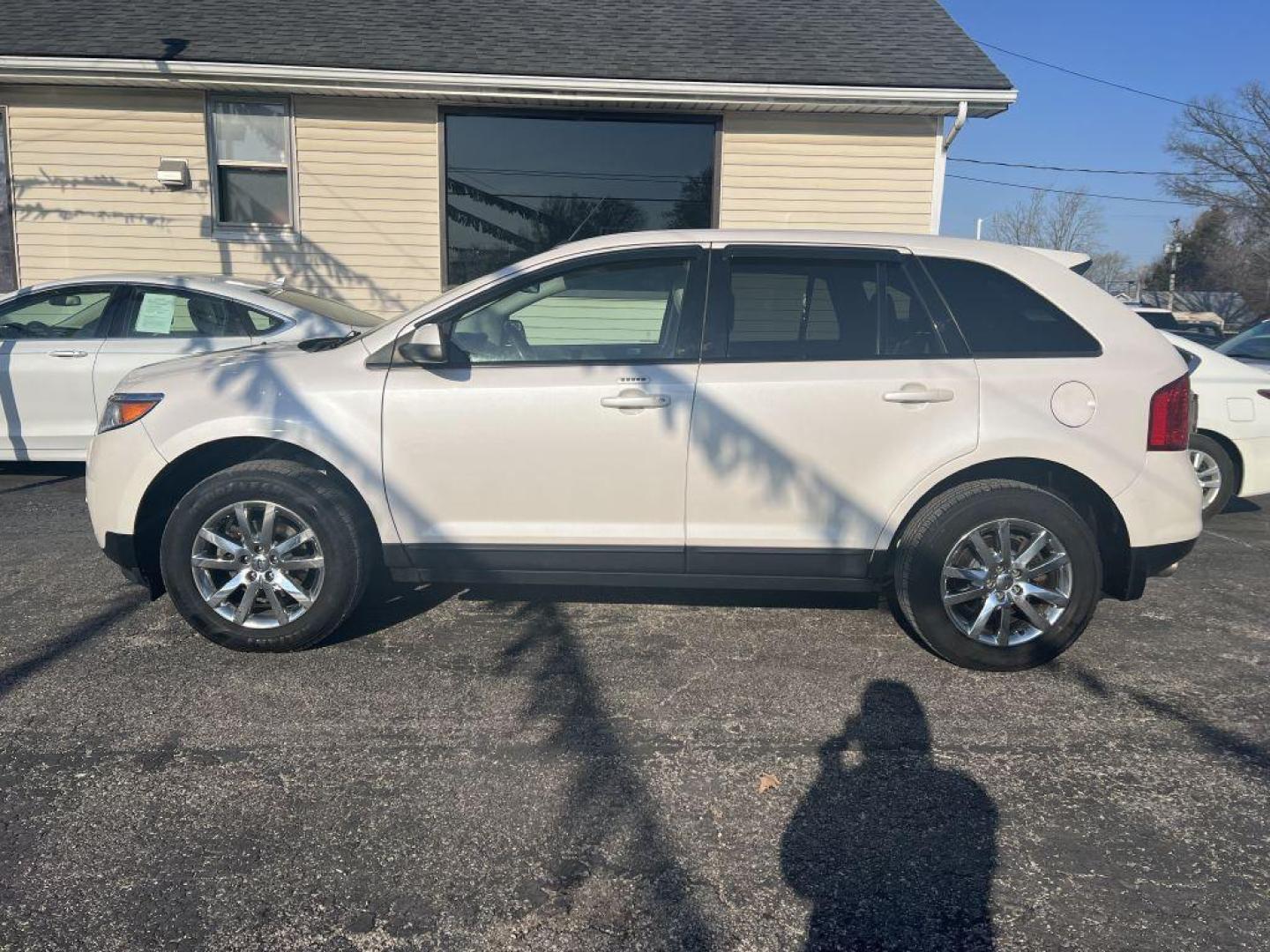 2014 WHITE FORD EDGE SEL (2FMDK3JCXEB) with an 3.5L engine, Automatic transmission, located at 1056 E Riverside Dr, Evansville, IN, 47714, (812) 423-7026, 37.953491, -87.546654 - Photo#0