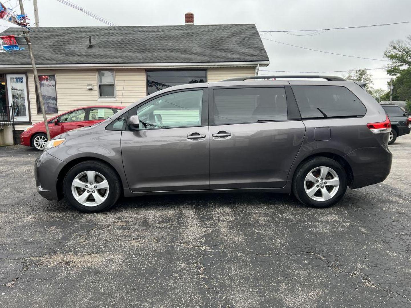 2013 GRAY TOYOTA SIENNA LE (5TDKK3DC6DS) with an 3.5L engine, Automatic transmission, located at 1056 E Riverside Dr, Evansville, IN, 47714, (812) 423-7026, 37.953491, -87.546654 - Photo#0