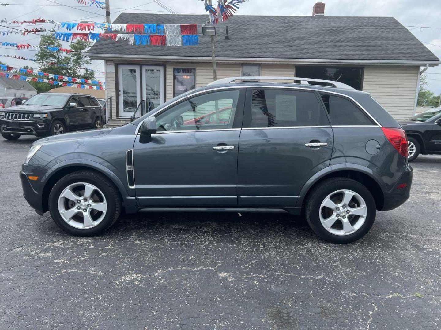 2013 GRAY CHEVROLET CAPTIVA LTZ (3GNAL4EK8DS) with an 2.4L engine, Automatic transmission, located at 1056 E Riverside Dr, Evansville, IN, 47714, (812) 423-7026, 37.953491, -87.546654 - Photo#0