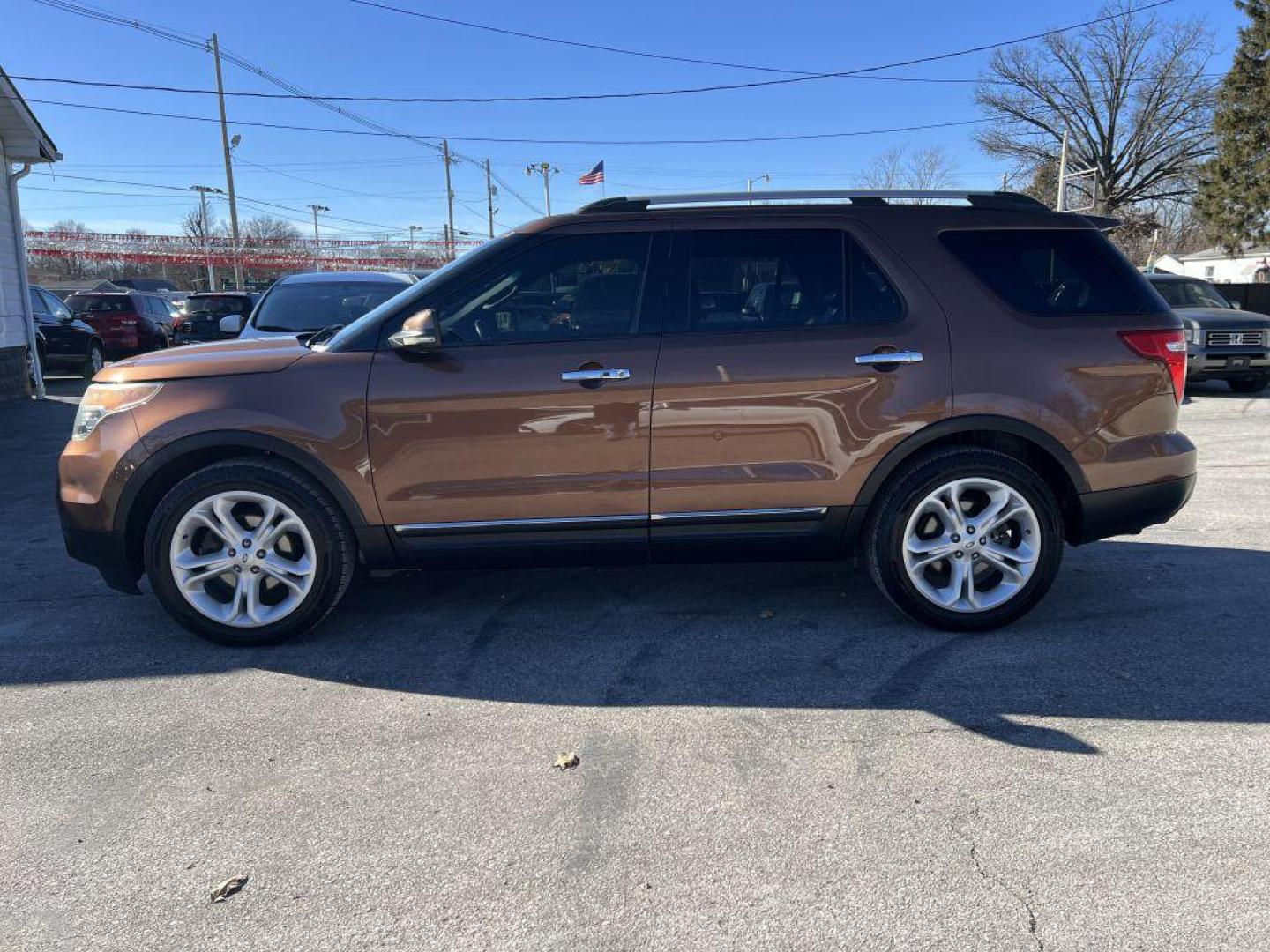 2012 BROWN FORD EXPLORER LIMITED (1FMHK7F88CG) with an 3.5L engine, Automatic transmission, located at 1056 E Riverside Dr, Evansville, IN, 47714, (812) 423-7026, 37.953491, -87.546654 - Photo#0