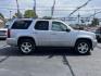 2014 SILVER CHEVROLET TAHOE 1500 LS (1GNSCAE04ER) with an 5.3L engine, Automatic transmission, located at 1056 E Riverside Dr, Evansville, IN, 47714, (812) 423-7026, 37.953491, -87.546654 - Photo#0