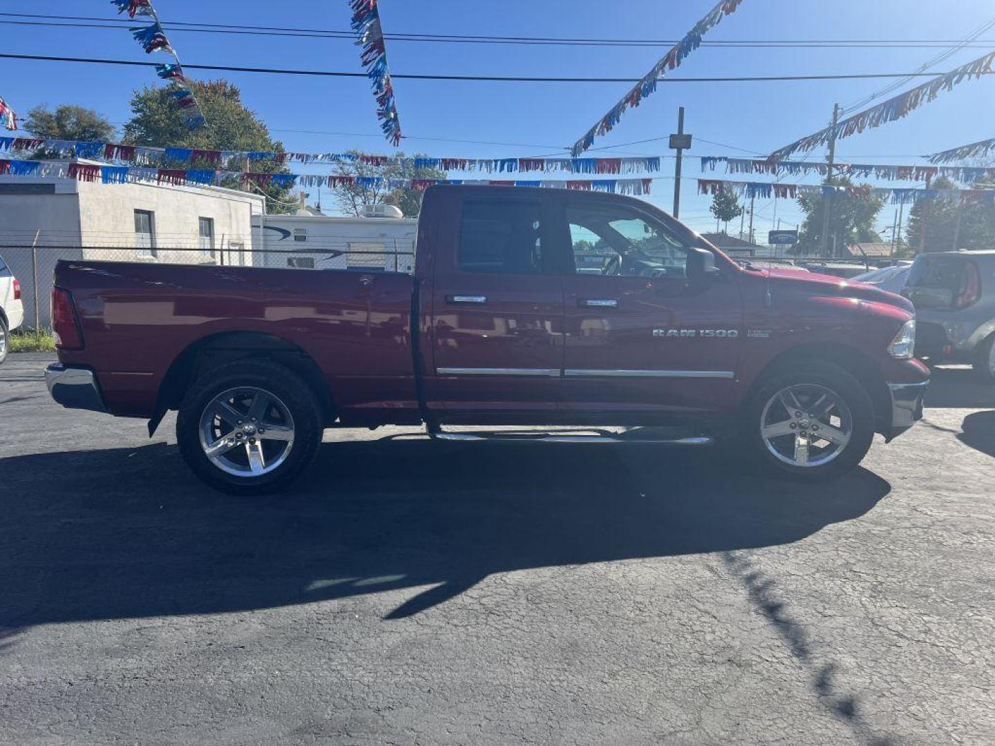 2012 RED DODGE RAM 1500 SLT (1C6RD7GT3CS) with an 5.7L engine, Automatic transmission, located at 1056 E Riverside Dr, Evansville, IN, 47714, (812) 423-7026, 37.953491, -87.546654 - Photo#0