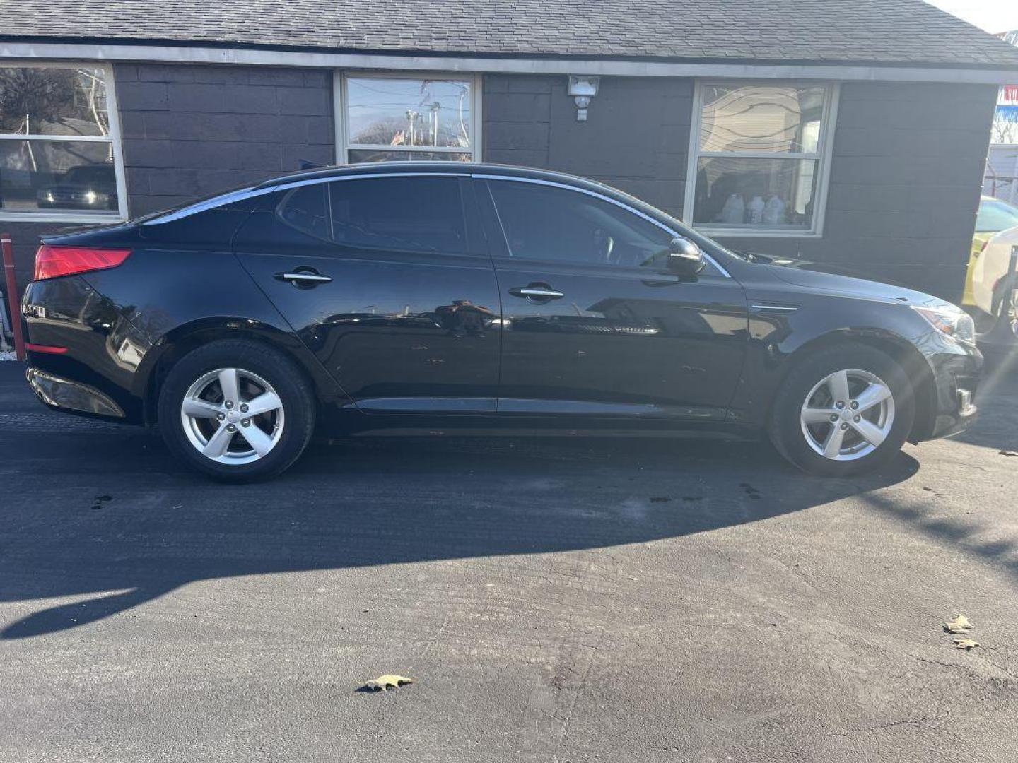 2015 BLACK KIA OPTIMA LX (5XXGM4A72FG) with an 2.4L engine, Automatic transmission, located at 1056 E Riverside Dr, Evansville, IN, 47714, (812) 423-7026, 37.953491, -87.546654 - Photo#0