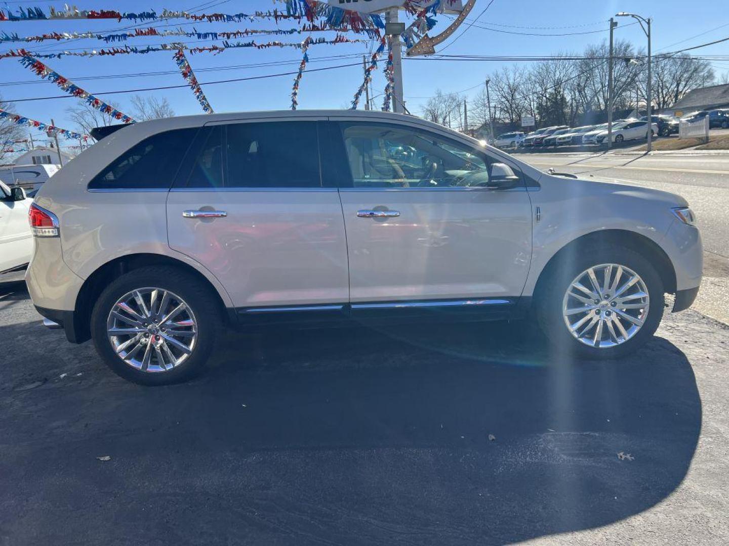 2015 TAN LINCOLN MKX (2LMDJ8JK7FB) with an 3.7L engine, Automatic transmission, located at 1056 E Riverside Dr, Evansville, IN, 47714, (812) 423-7026, 37.953491, -87.546654 - Photo#0