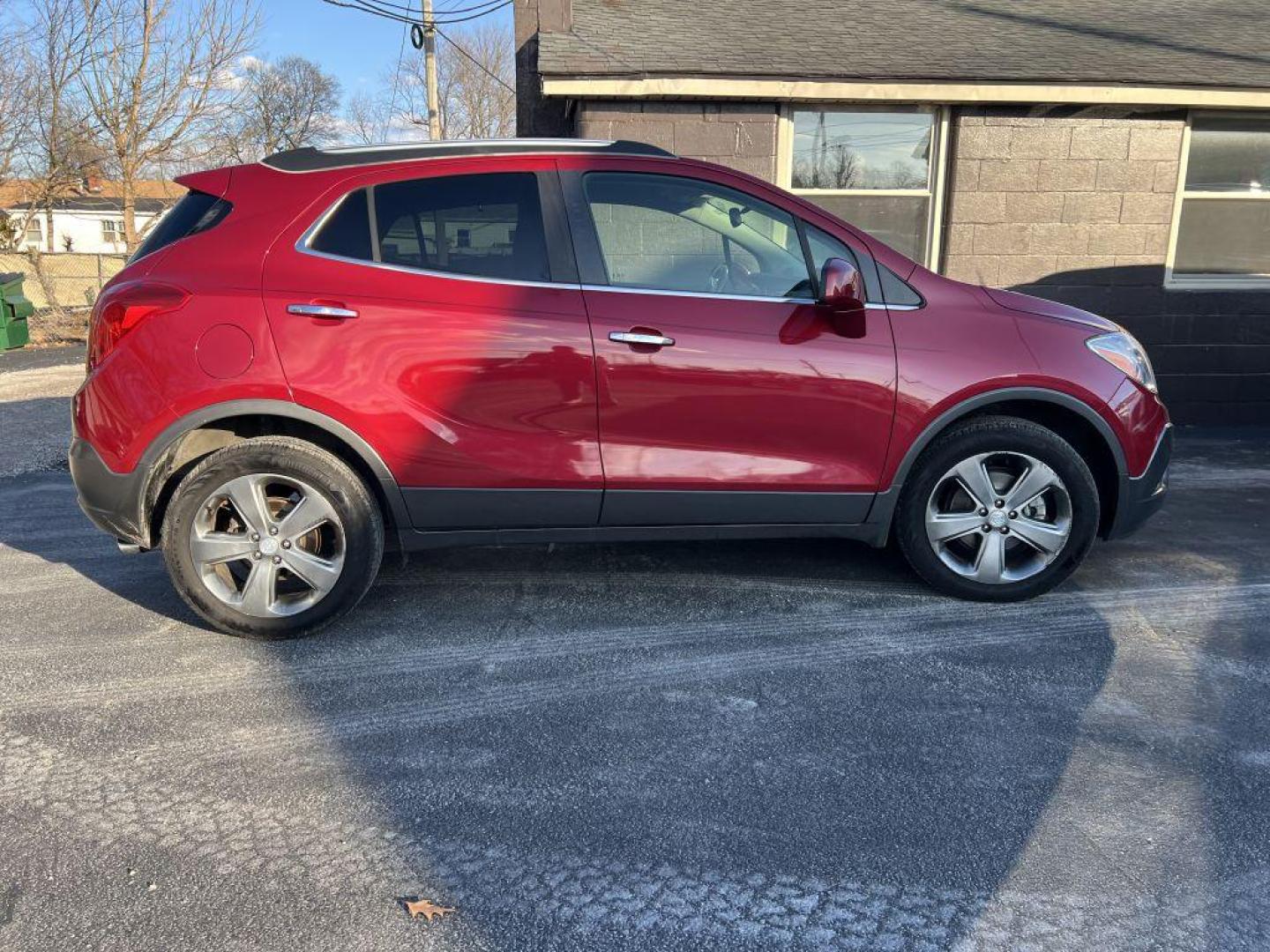 2013 RED BUICK ENCORE (KL4CJASB1DB) with an 1.4L engine, Automatic transmission, located at 1056 E Riverside Dr, Evansville, IN, 47714, (812) 423-7026, 37.953491, -87.546654 - Photo#0